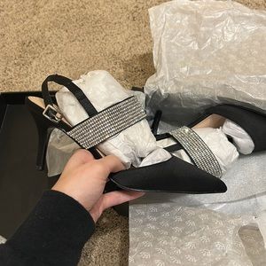 Black pointed toe sparkly strap heel